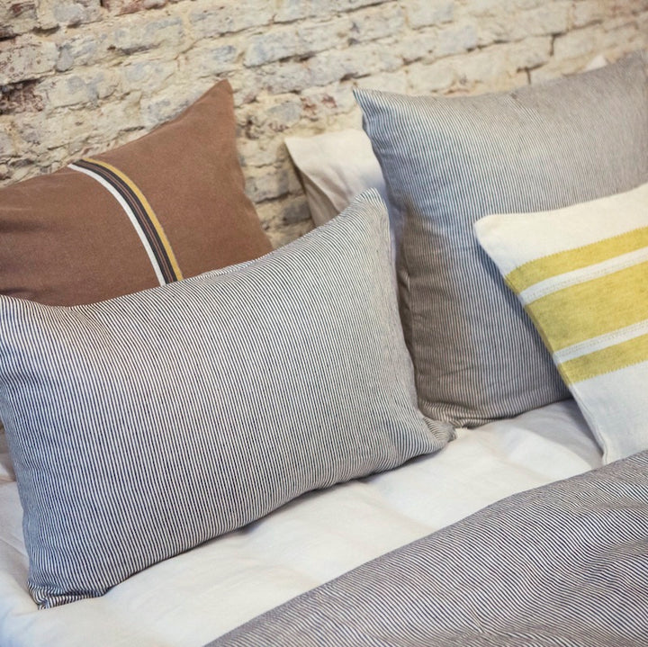 Libeco Belgian linen The Workshop Stripe pillow cases and sham with dark steel grey pin stripes on flax natural linen
