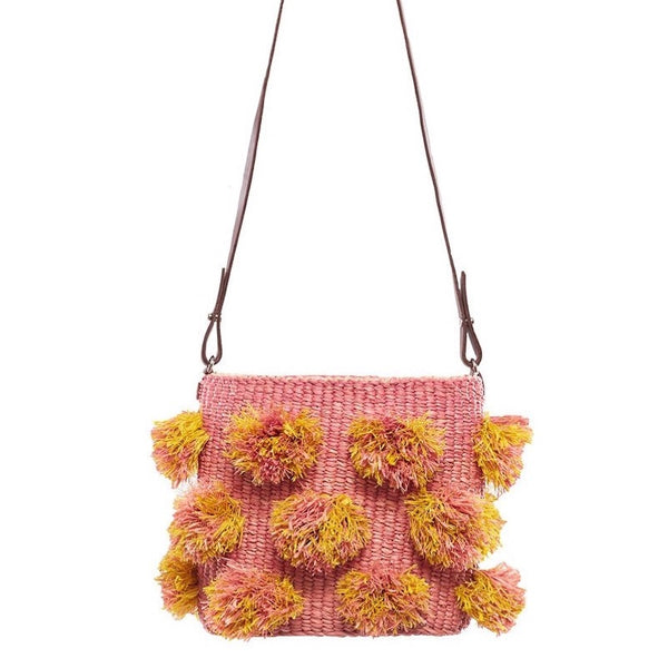 raffia pompom bag features an all over fringe detailing in soft pink and yellow colors with 39" leather strap drop