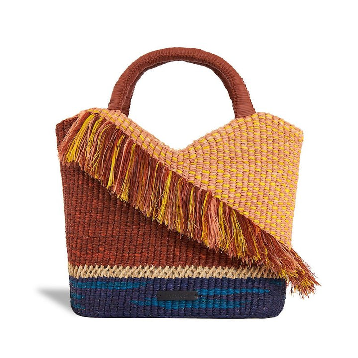 AAKS Oroo Oak large raffia tote bag with fringe detail across weaving of soft yellow, pink and dark ocean blue base and wine red leather wrapped handles