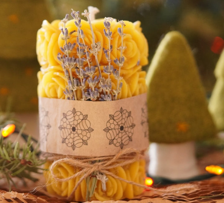 Beecasa beeswax candles from Malibu Farm is the large pillar candle with carved flowers