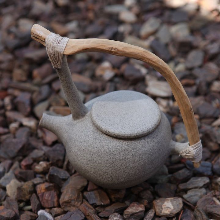 Handcrafted stone teapot with Juniper wood handle is like an