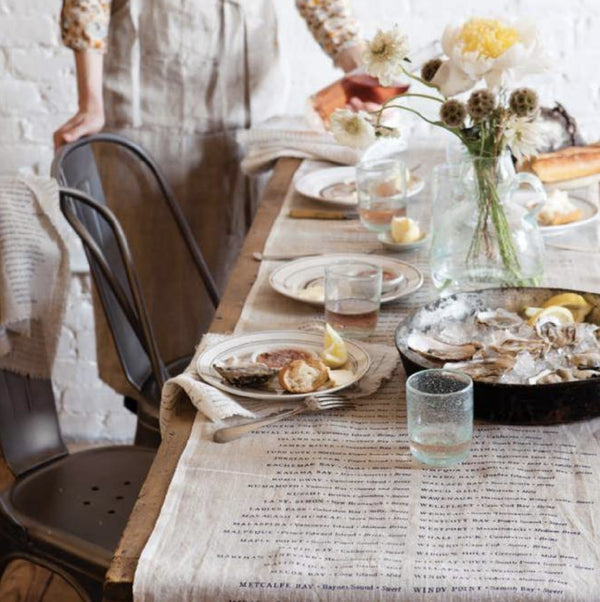 Linen Table Runner with a List of Oysters